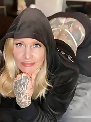 Mature tattooed bitch shows her boobs